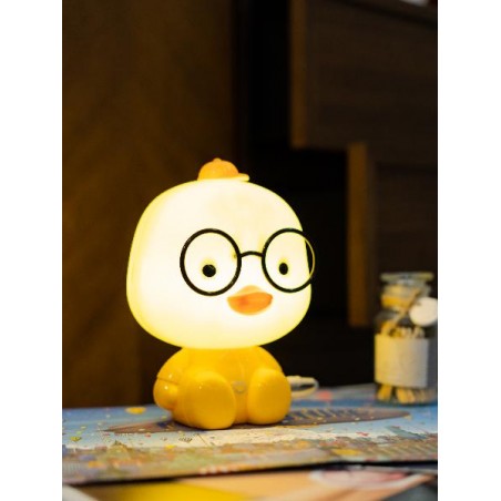 Lampada Duck illuminata con ambientazione notturna
