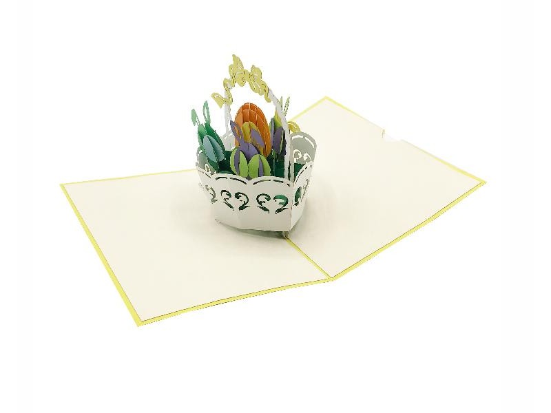 Biglietto di Pasqua con uova colorate in cestino bianco, effetto pop-up 3D