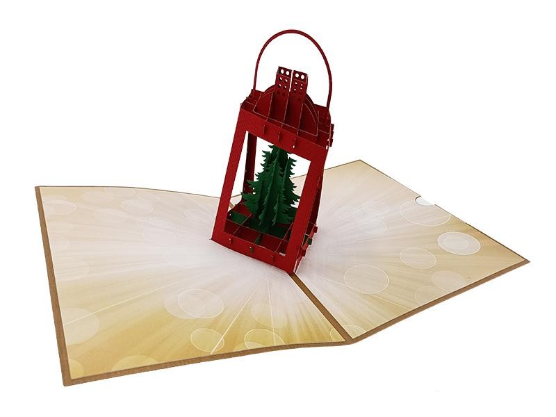 Biglietto pop-up 3D lanterna natalizia con alberi verdi