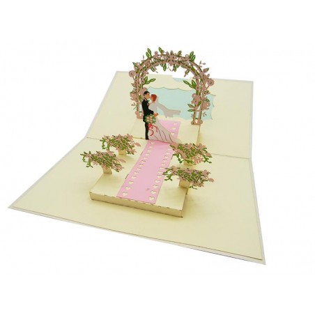 Biglietto Auguri Matrimonio con sposi sulla navata rosa sotto arco floreale 3D