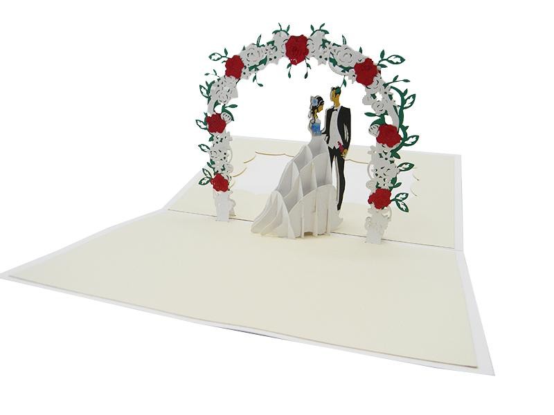 Biglietto Auguri Matrimonio con sposi sotto arco floreale 3D in rilievo