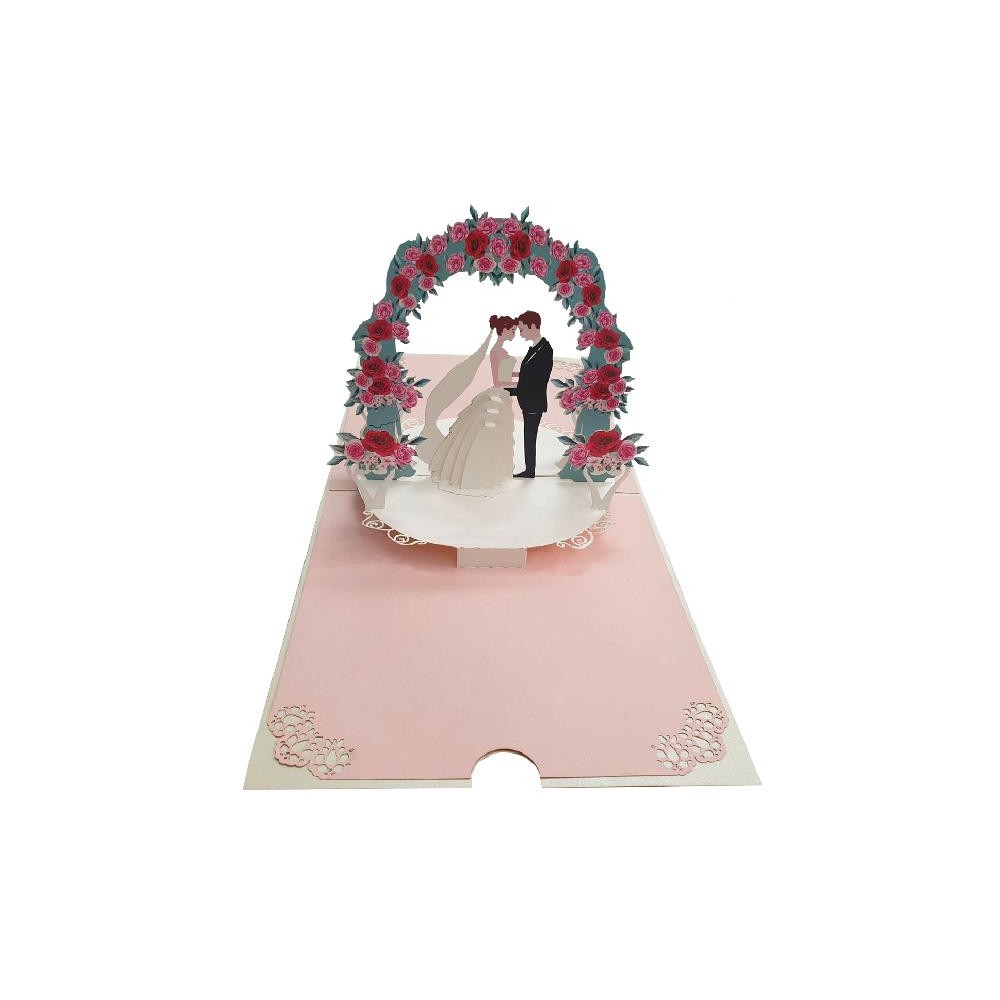 Biglietto pop-up 3D con arco di rose rosa e rosse e sposi abbracciati