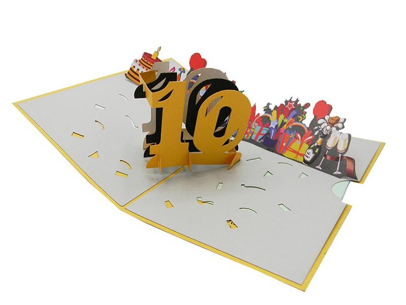 Interno pop-up 3D con numero 10, torta, regali e decorazioni festa